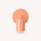 Adjustable spot LED Nordic wall light in pink from the front — swivel spot head and slim wall mount detail.