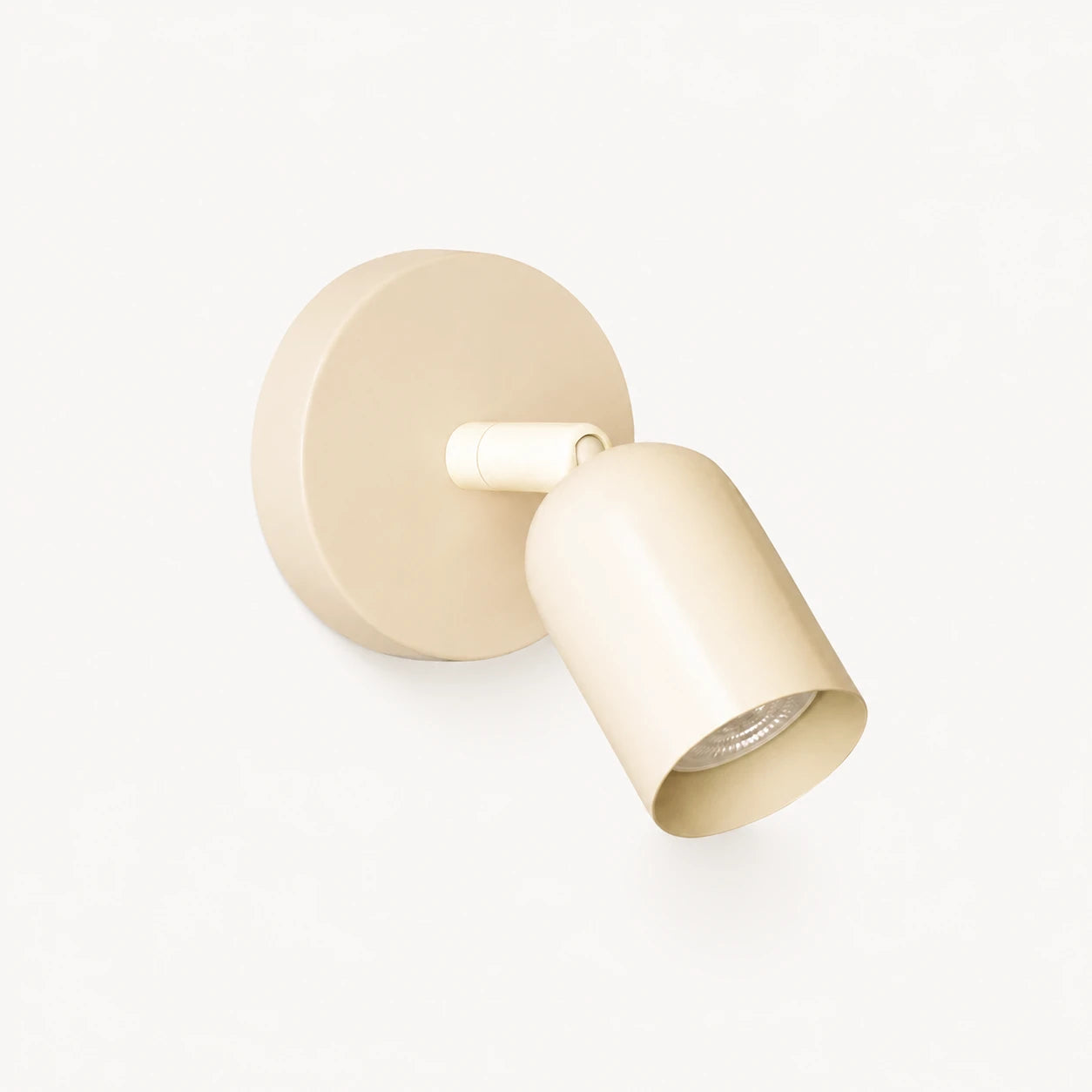 Adjustable spot LED Nordic wall light in white — a clean minimal directional spotlight for modern and Scandi bedrooms.