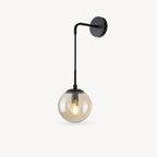 Black amber glass hook arm Nordic wall sconce with amber-tinted glass globe and matte black hook hardware detail