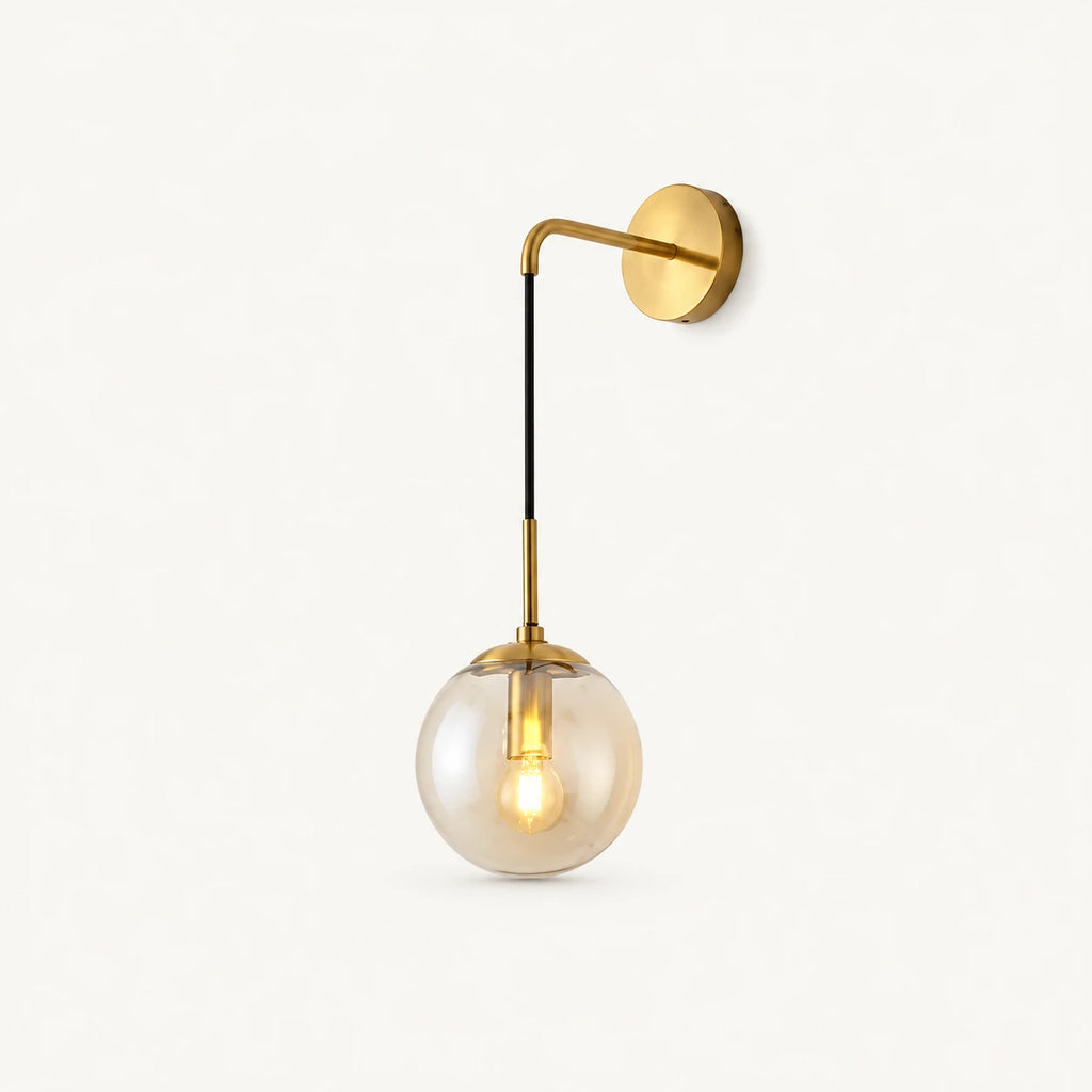 Gold amber glass hook arm Nordic wall sconce with amber-tinted glass globe and brushed gold hook hardware detail