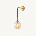 Gold amber glass hook arm Nordic wall sconce with amber-tinted glass globe and brushed gold hook hardware detail