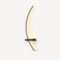 Black crescent arc LED bedside wall light in left-facing orientation — arc curves toward the centre of the bed.