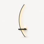Black crescent arc LED bedside wall light in left-facing orientation — arc curves toward the centre of the bed.