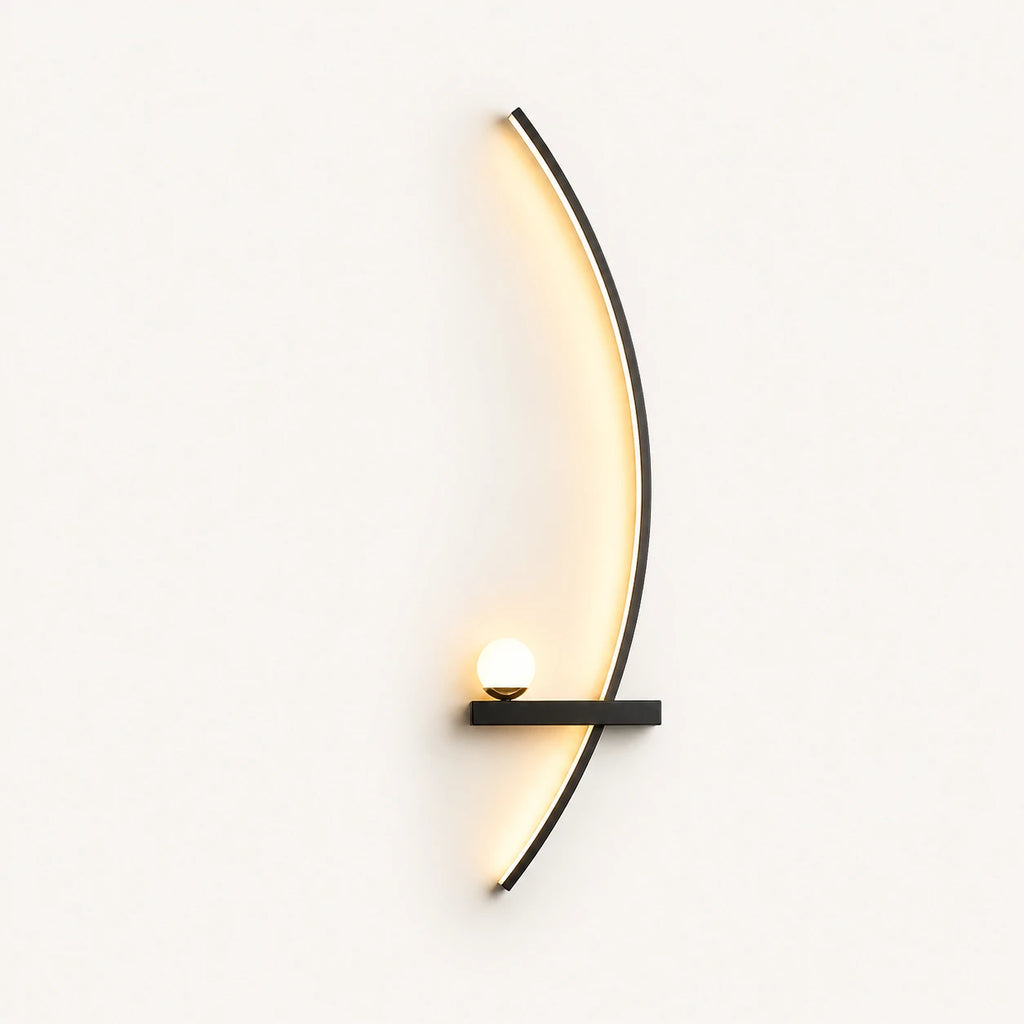 Black crescent arc LED bedside wall light in right-facing orientation — arc curves toward the centre of the bed.