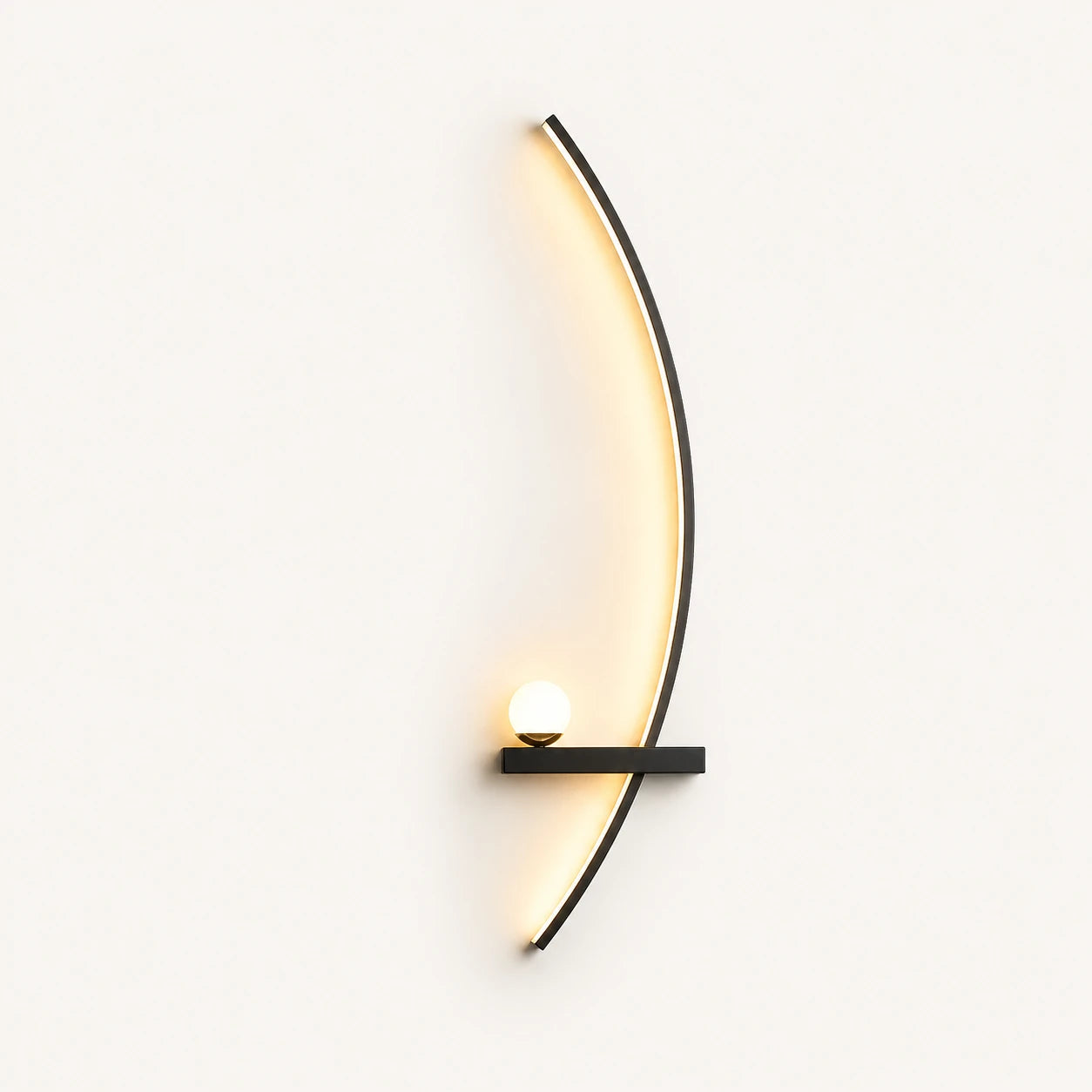 Black crescent arc LED bedside wall light in right-facing orientation — arc curves toward the centre of the bed.
