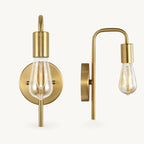 All-gold bare bulb industrial wall sconce with brushed gold arm and socket holding Edison globe light bulb detail