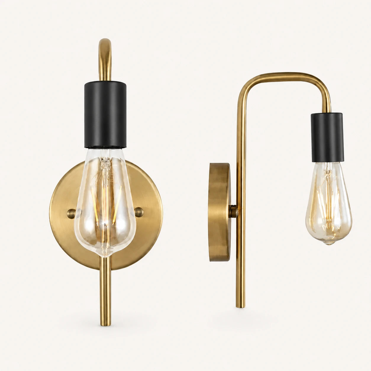 Gold and black bare bulb industrial wall sconce with gold arm and black socket holding Edison globe bulb detail