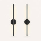 Black rechargeable wireless minimalist wall light from the side — slim rechargeable body and USB-C charging port detail.