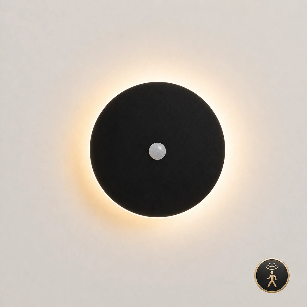 Black halo LED wall light 30cm with motion sensor — hands-free activation for hallways, staircases, and landing walls.