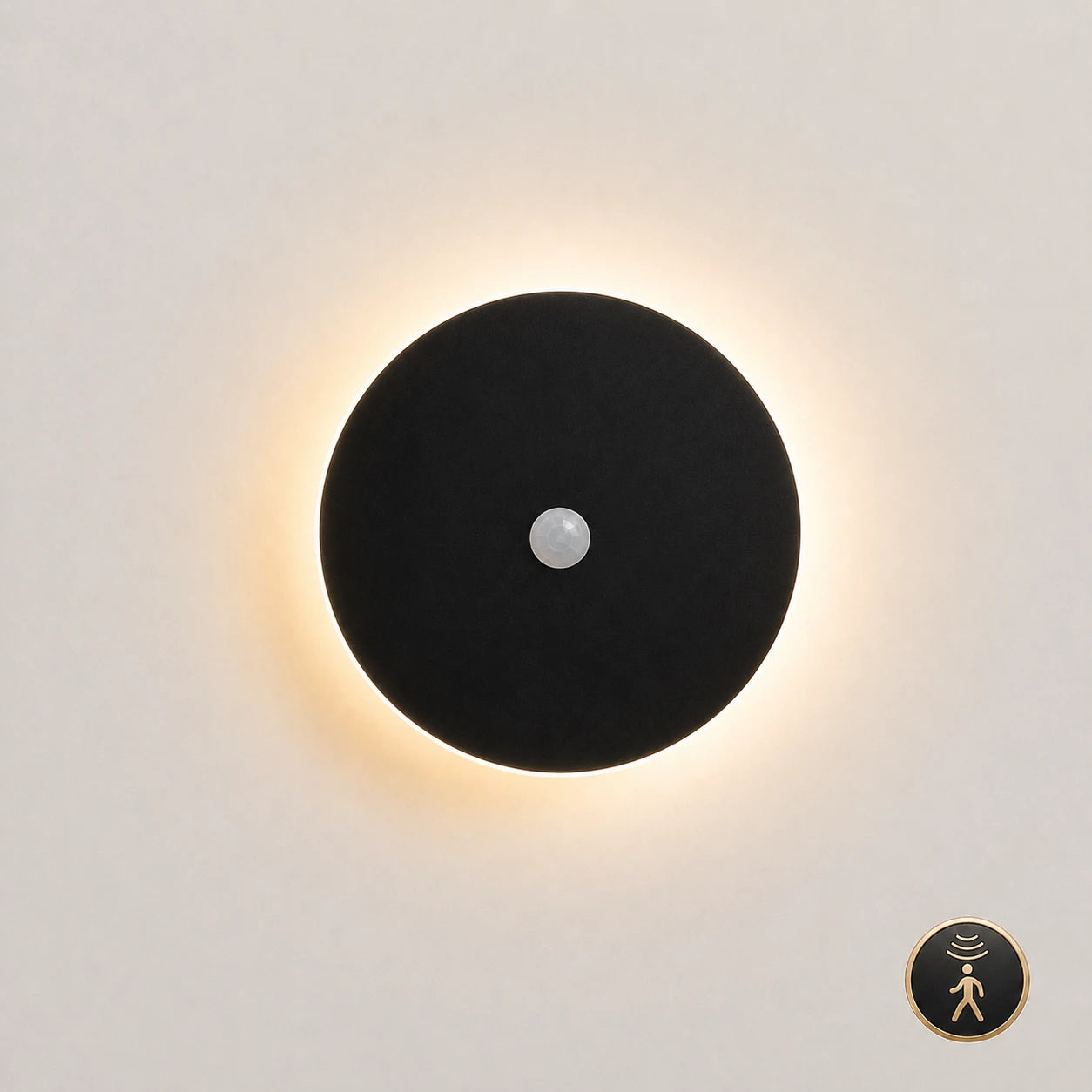 Black halo LED wall light 30cm with motion sensor — hands-free activation for hallways, staircases, and landing walls.