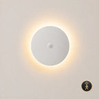 White halo LED wall light 20cm with motion sensor — automatically activates on approach for hands-free hallway lighting.
