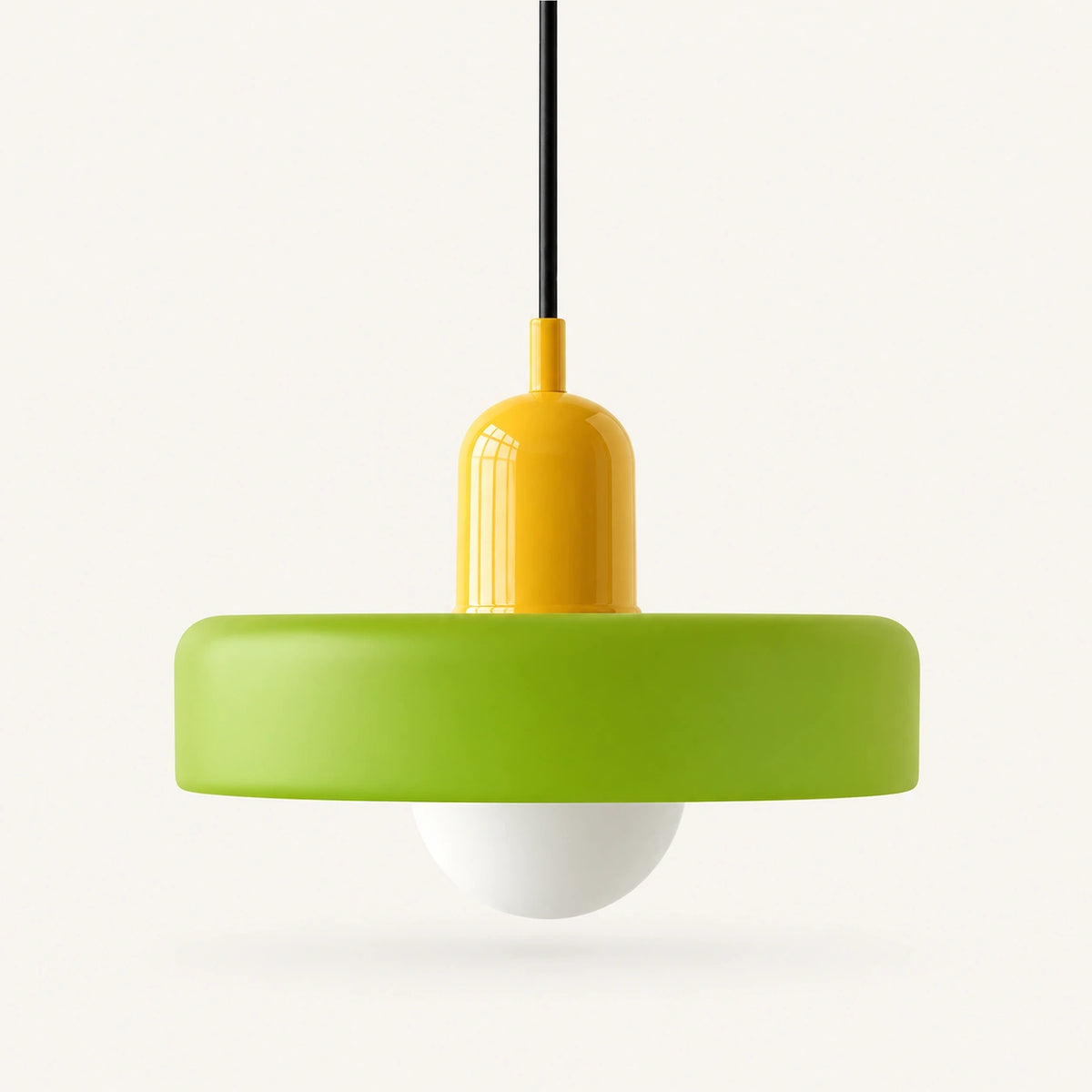 Coloured Glass Bauhaus Pendant Light shown in Green glass and Yellow fitting, highlighting the compact pendant shape and finish.