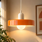 Coloured Glass Bauhaus Pendant Light in Orange glass with a Beige fitting and bold geometric Bauhaus styling.