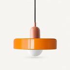Coloured Glass Bauhaus Pendant Light shown in Orange glass and Pink fitting, highlighting the compact pendant shape and finish.