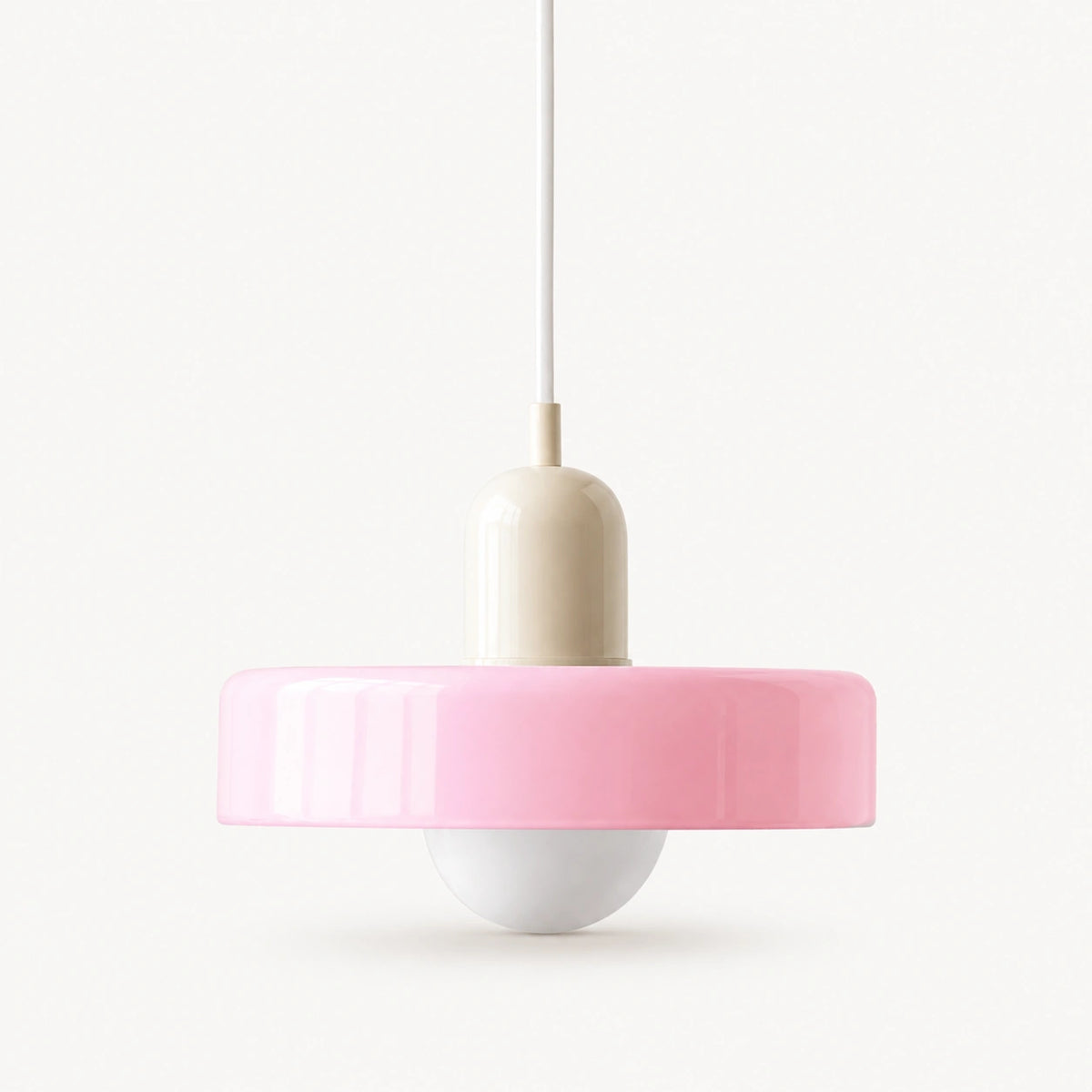 Coloured Glass Bauhaus Pendant Light shown in Pink glass and Beige fitting, highlighting the compact pendant shape and finish.