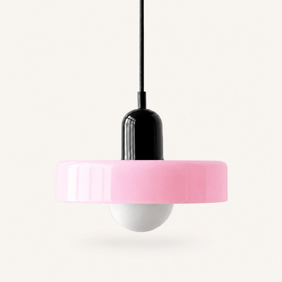 Coloured Glass Bauhaus Pendant Light shown in Pink glass and Black fitting, highlighting the compact pendant shape and finish.