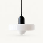 Coloured Glass Bauhaus Pendant Light shown in White glass and Black fitting, highlighting the compact pendant shape and finish.