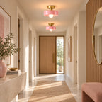 Coloured Glass Bauhaus Semi-Flush Ceiling Light in Pink glass and Gold fitting installed above furniture in a hallway setting.
