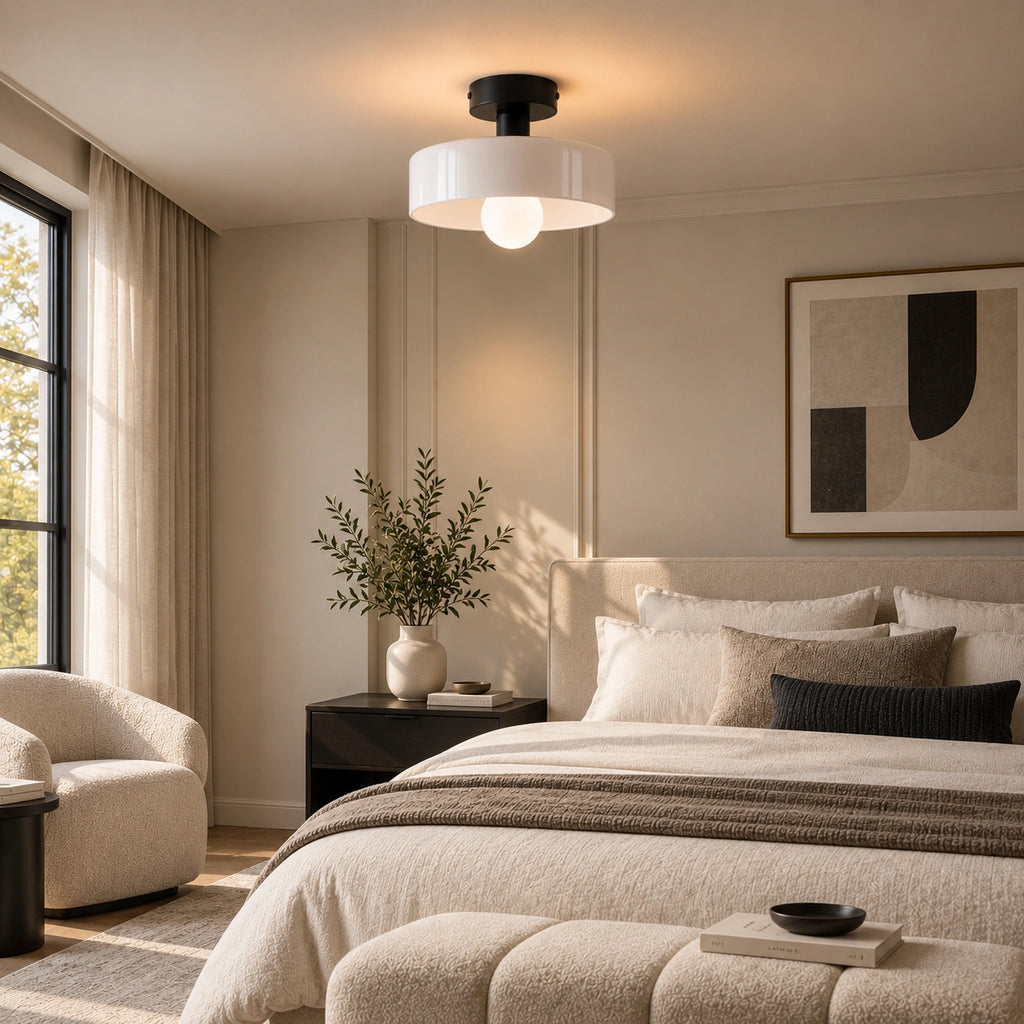 Coloured Glass Bauhaus Semi-Flush Ceiling Light in White glass and Black fitting installed above furniture in a bedroom setting.