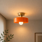 Coloured Glass Bauhaus Semi-Flush Ceiling Light in Orange glass with a Gold fitting and bold geometric Bauhaus styling.
