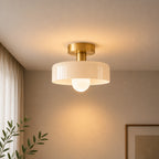 Coloured Glass Bauhaus Semi-Flush Ceiling Light in White glass with a Gold fitting and bold geometric Bauhaus styling.