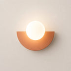 Colourful Glass Globe Nordic Wall Light in dusty pink finish with frosted white glass globe shade