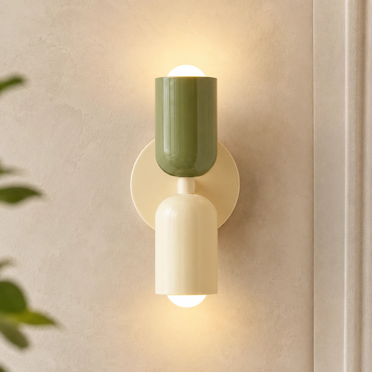 Colourful Nordic indoor wall light — green and white cylindrical shades on a cream backplate for a soft natural Scandinavian look.