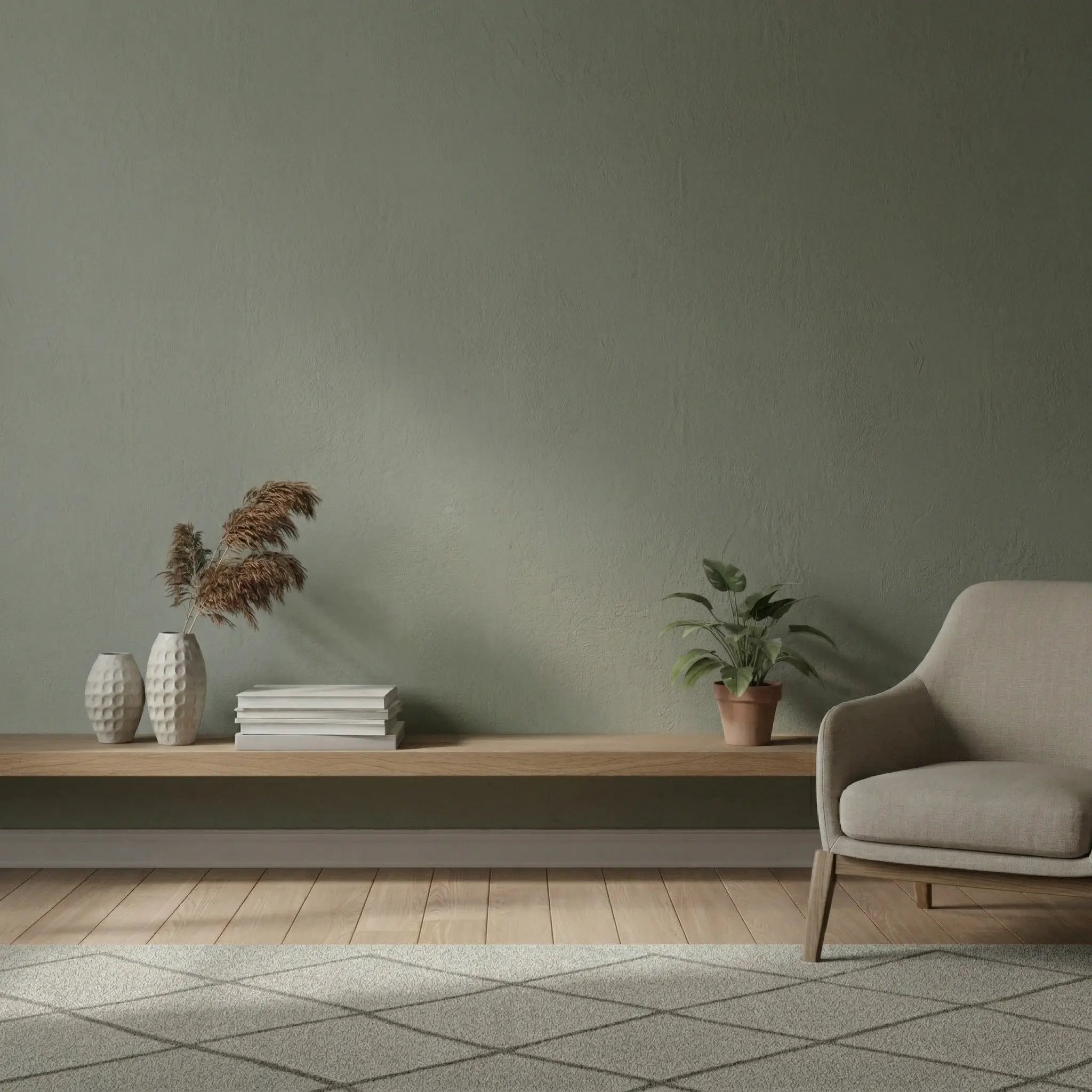 Sage green living room with wooden shelf and beige armchair before installing the colourful Nordic up and down wall light