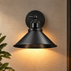 Black cone arm industrial wireless wall sconce shown from the front, highlighting its slim swing arm and cone shade design.