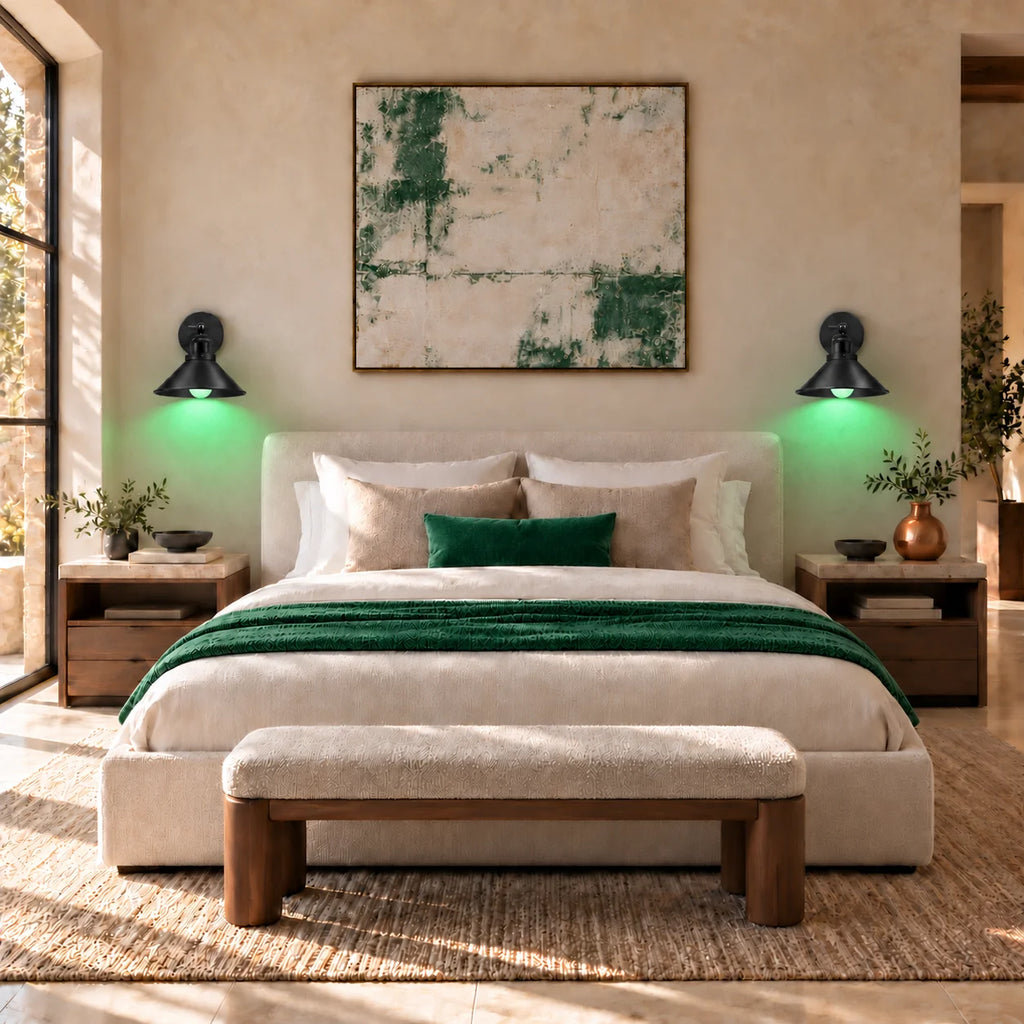 Black cone arm industrial wall sconce glowing in green RGB mode, mounted beside a bed for colourful ambient night lighting.