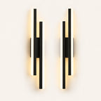 Double strip LED modern wall light in black as a matched left and right pair for a double bed.