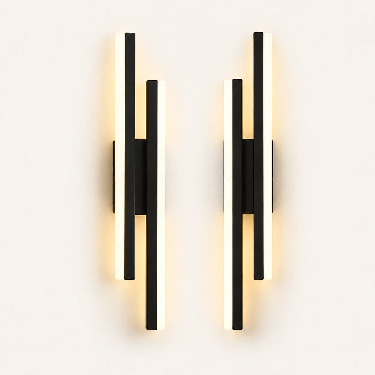 Double strip LED modern wall light in black as a matched left and right pair for a double bed.