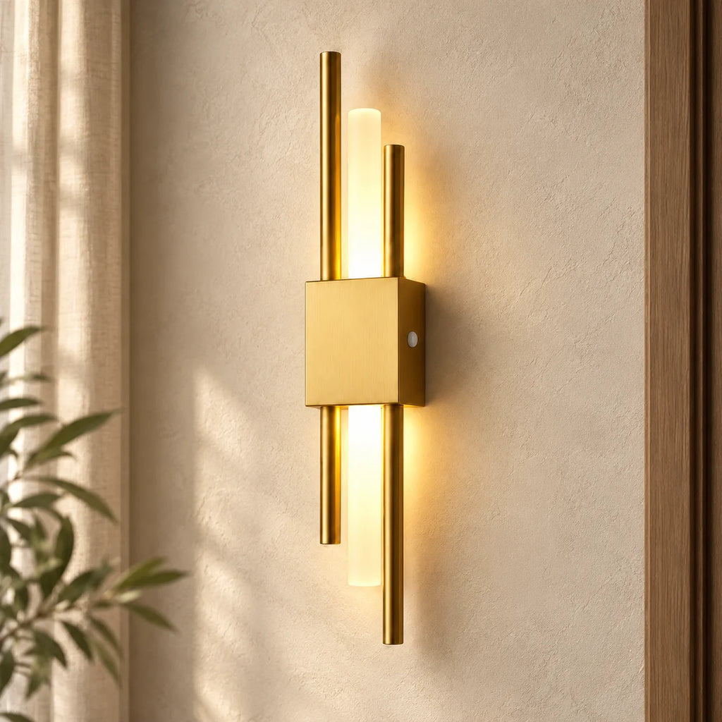 Gold double bar modern rechargeable LED wall light mounted in the left placement, with dual brass bars framing a soft glow.