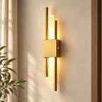 Gold double bar modern rechargeable LED wall light mounted in the left placement, with dual brass bars framing a soft glow.