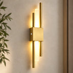 Gold double bar modern rechargeable LED wall light mounted in the right placement, with dual brass bars framing a soft glow.