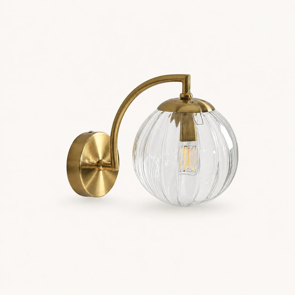 Gold Ribbed Glass Globe Nordic Wall Sconce in gold frame with clear ribbed glass globe shade