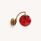 Gold Ribbed Glass Globe Nordic Wall Sconce in gold frame with red ribbed glass globe shade