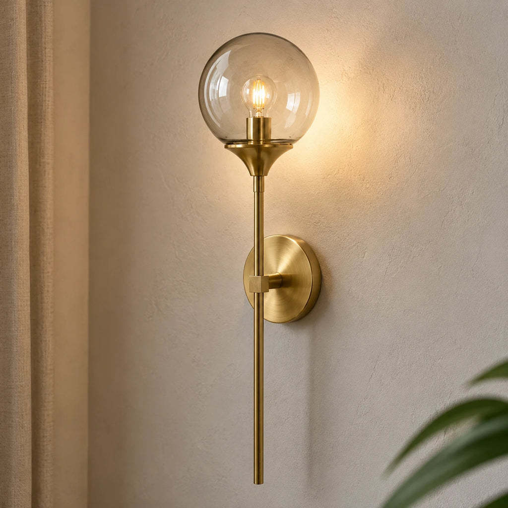Gold & Silver Long Stem Glass Globe Nordic Wall Sconce in gold with clear glass globe, hero shot