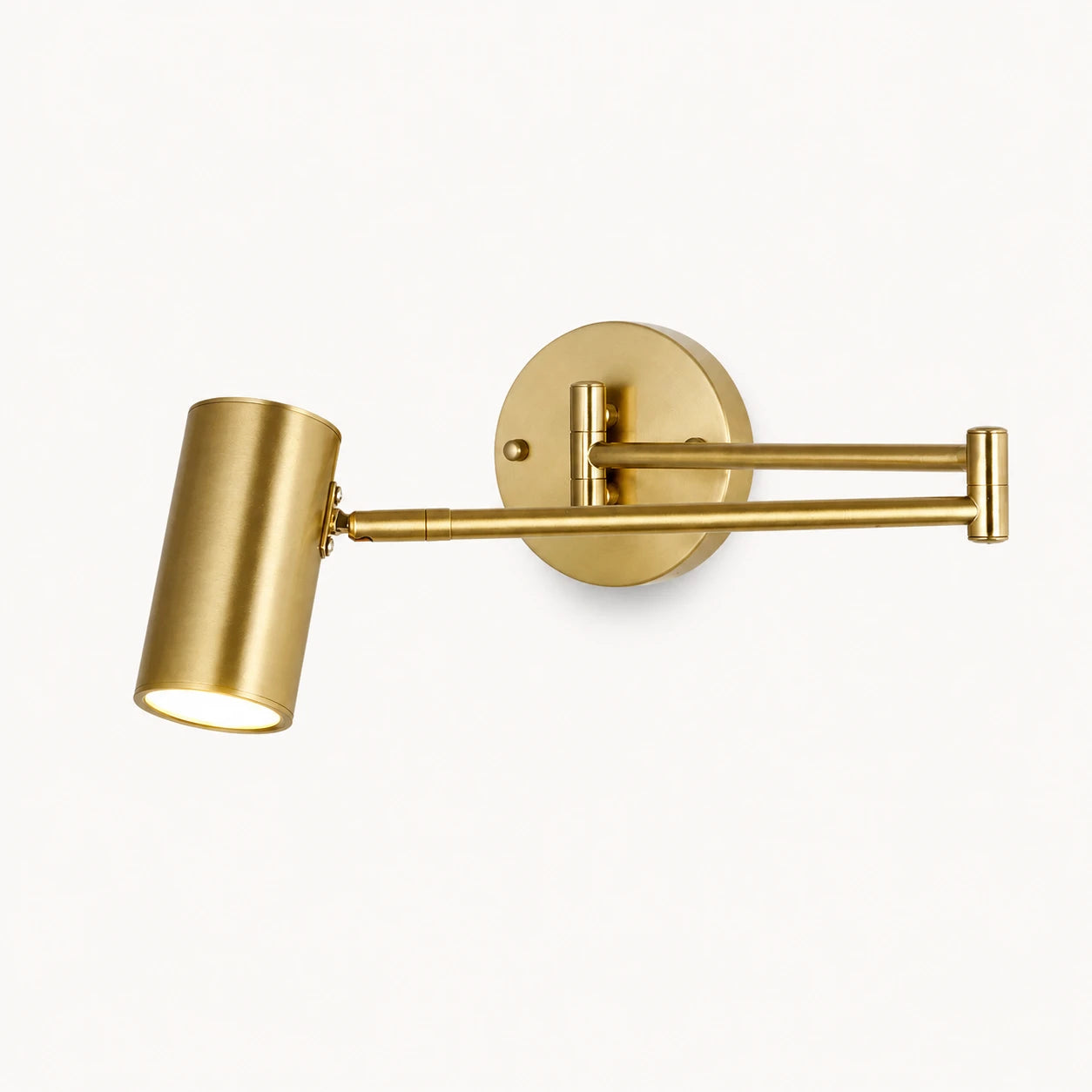 Industrial swing arm LED wall light with gold cylinder shade — brushed gold hardware and open cylinder shade product view.