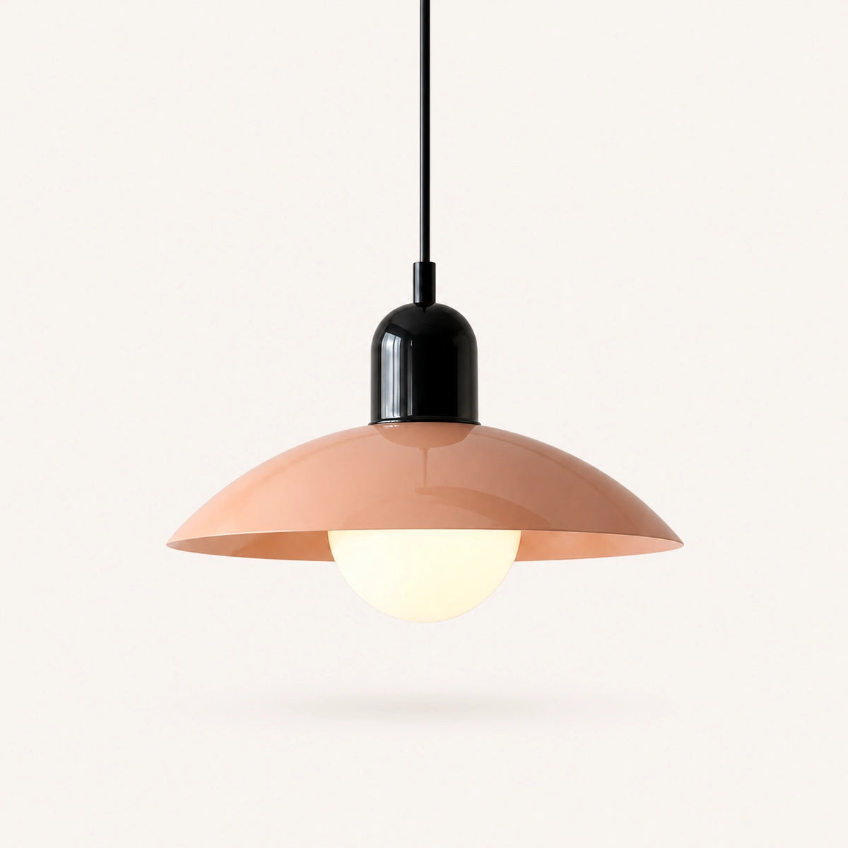 Macaron Dome Pendant Light shown in Pink shade and Black fitting, highlighting the compact design and finish.