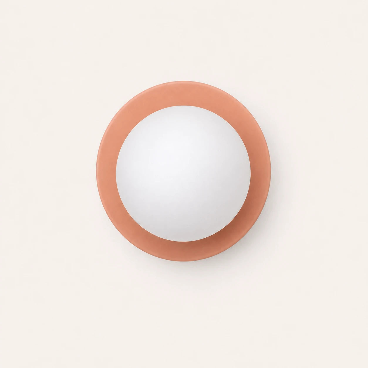 Mini Glass Orb Nordic Wall Light in pink, front-facing view showing circular disc and frosted glass orb