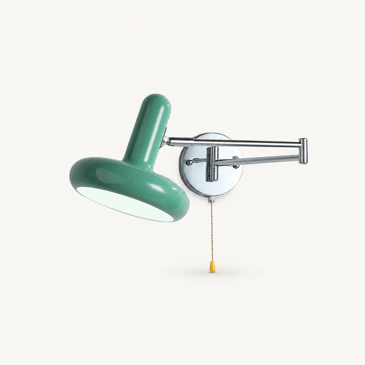 Pull cord swing arm retro wall light in green with pull cord — earthy tone for bohemian bedroom walls.