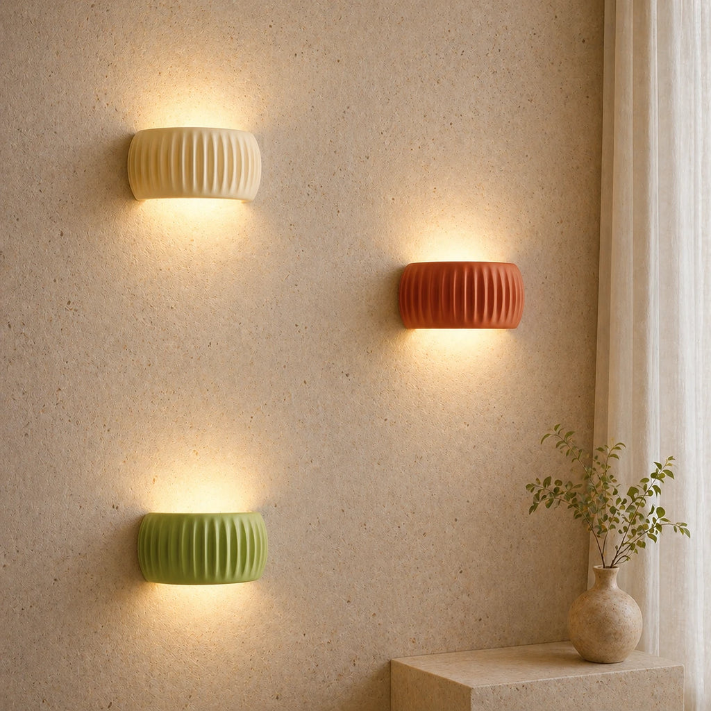 Ribbed resin Nordic wall light in terracotta — warm earthy tone for boho and natural Scandinavian interiors.