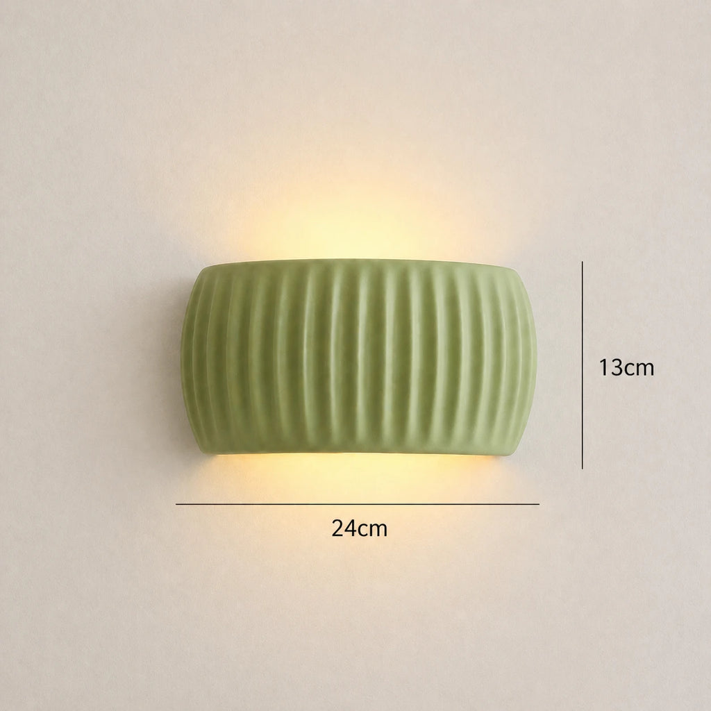 Ribbed resin Nordic wall light sage green — dimensions diagram showing height, width and wall projection measurements.