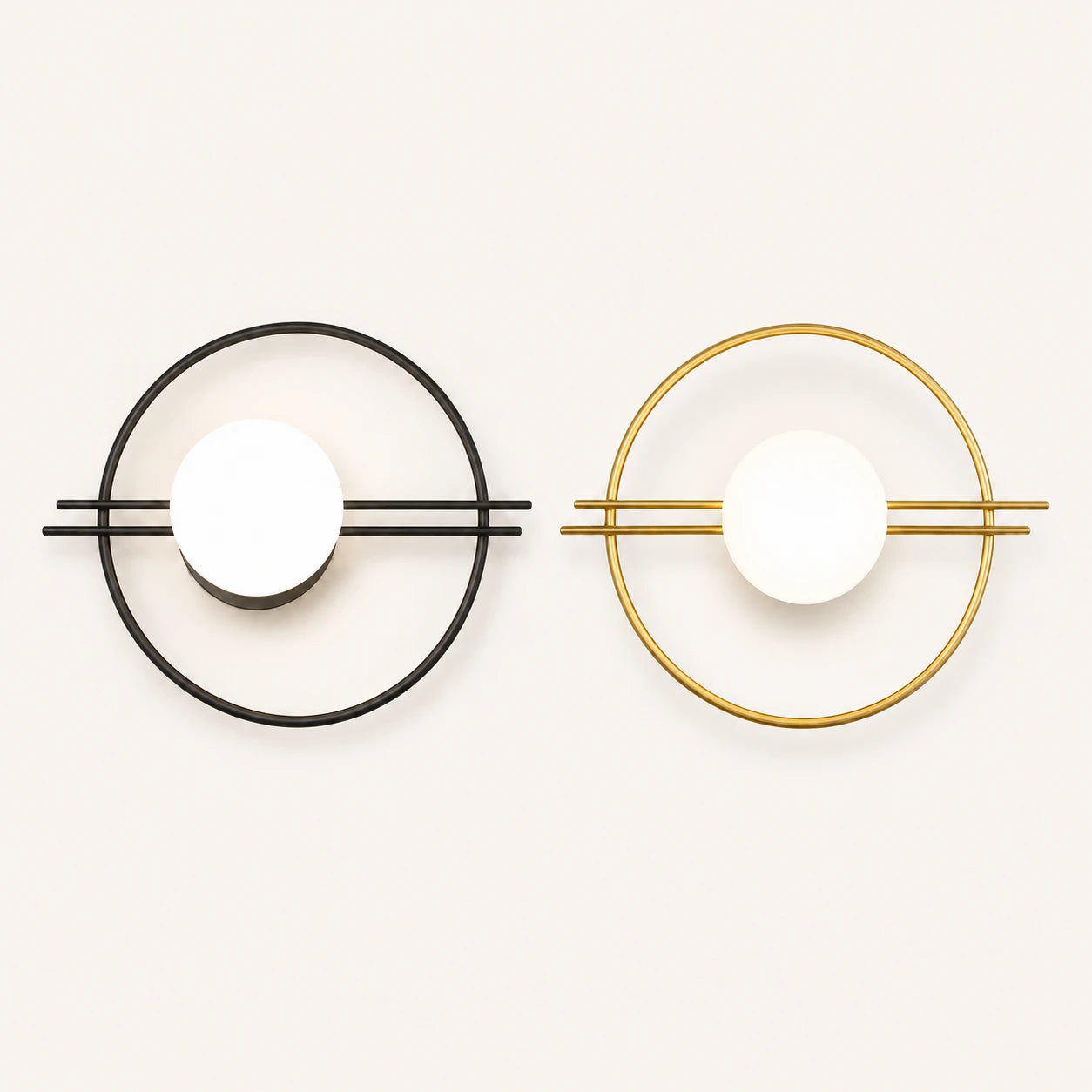 Ring frame globe LED modern wall sconce shown in black and gold finish options with white opal globe shade