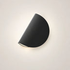Rotating half-disc LED modern wall light in black — bold minimal semicircular panel for statement walls and feature lighting.