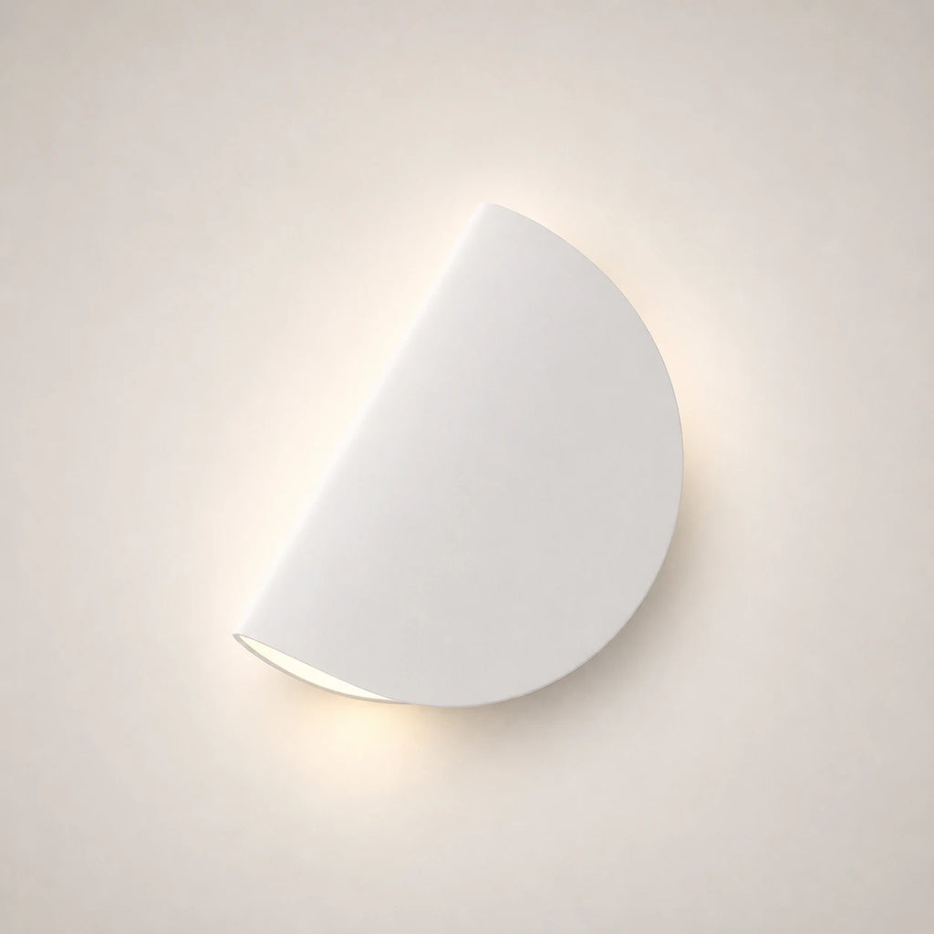Rotating half-disc LED modern wall light in white — clean minimal semicircular LED panel for modern and Nordic bedrooms.