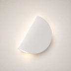 Rotating half-disc LED modern wall light in white — clean minimal semicircular LED panel for modern and Nordic bedrooms.