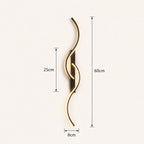 Sculptural dual-curve LED modern wall light in black 60cm — compact curved form for bedroom and hallway walls.