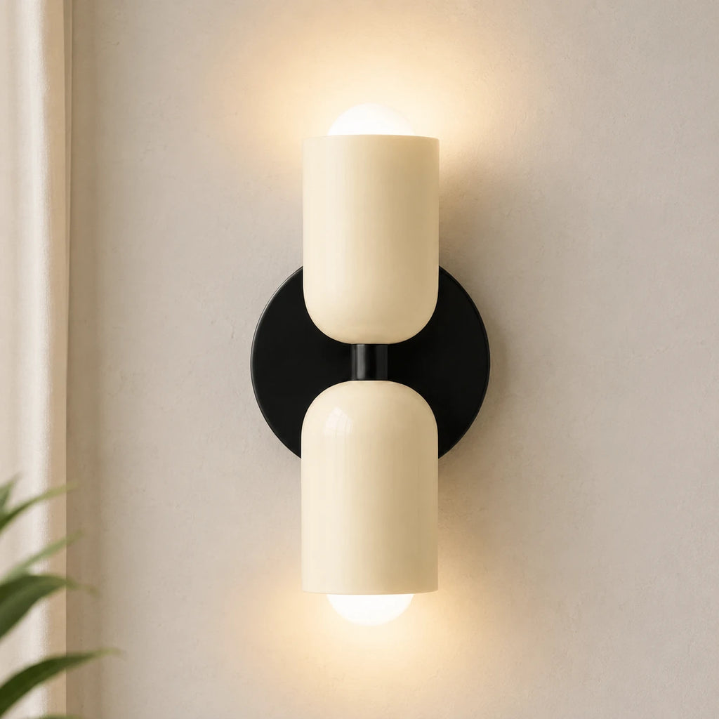Two-tone Nordic indoor wall light — cream and black cylindrical shades.